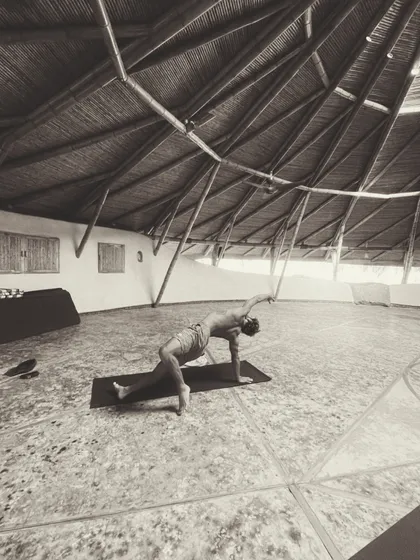 Person practicing yoga in an open space