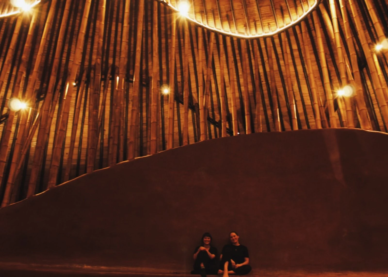 Interior of La Maloca lit at night