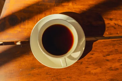 Cup of coffee on a wooden table